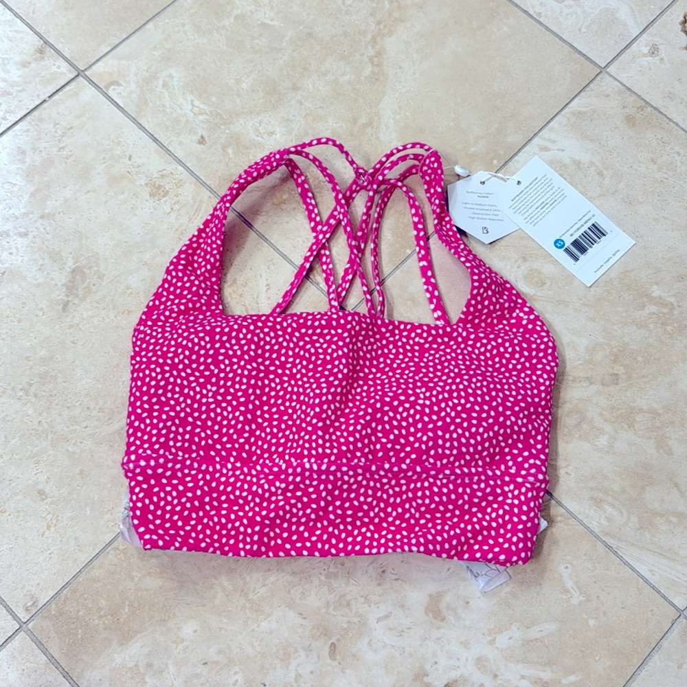 Buffbunny dream house collection in pink boss print. Size XS.